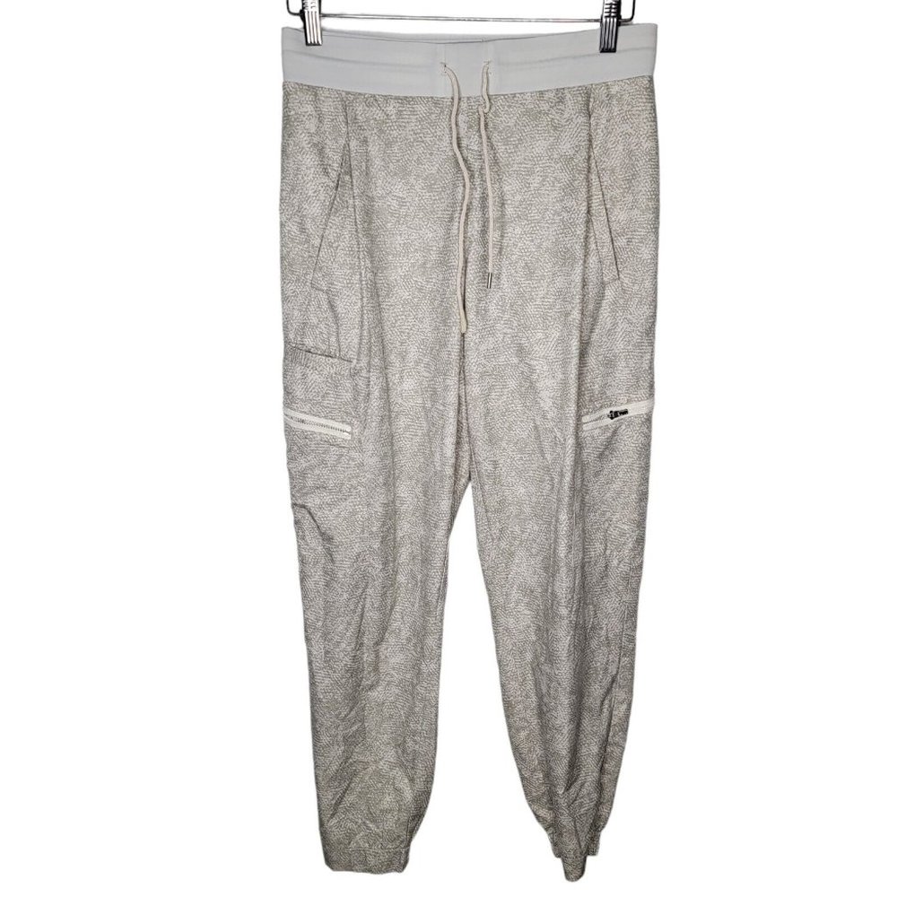 Athleta Venture Printed Pant Size 4 Cream / Gray Zipper Pockets Jogger‎